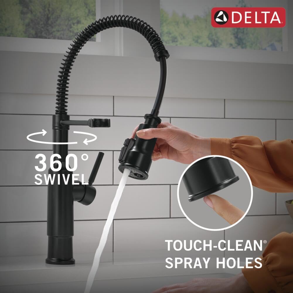 Matte black single-handle kitchen faucet with curved spring spout, pull-down sprayer, and 360-degree swivel.
