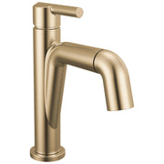 Champagne bronze single-handle bathroom faucet with pull-down spout and cylindrical body.