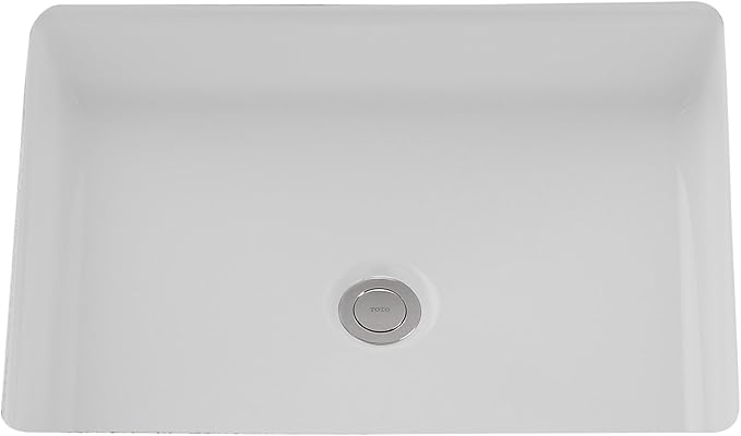 White rectangular undermount bathroom sink with rounded corners and center drain, viewed from above.