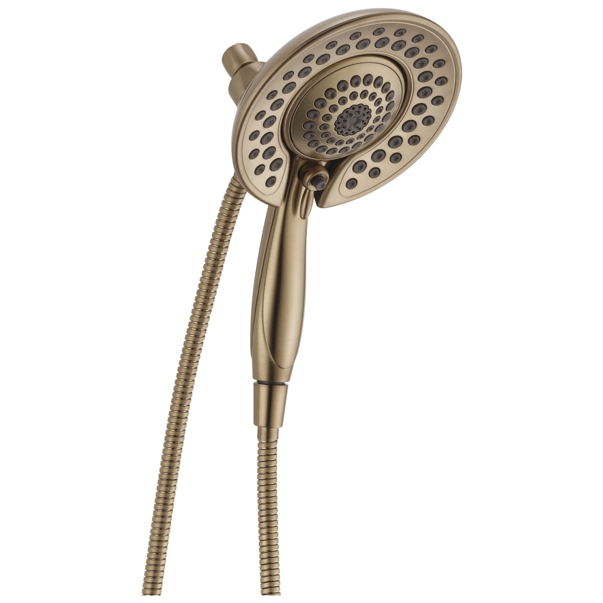Champagne bronze two-in-one shower head with perforated disc design and hand shower connected by flexible hose.