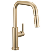 Champagne bronze single-handle kitchen faucet with pull-down spout and cylindrical handle.