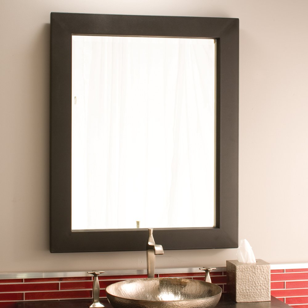 Rectangular dark frame mirror with reflective surface mounted above a metallic vessel sink.
