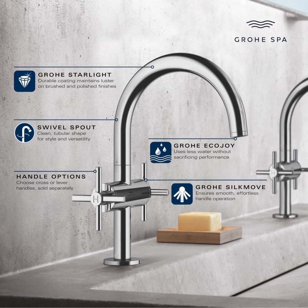 Chrome bathroom faucet with curved swivel spout and single lever handle on marble countertop.