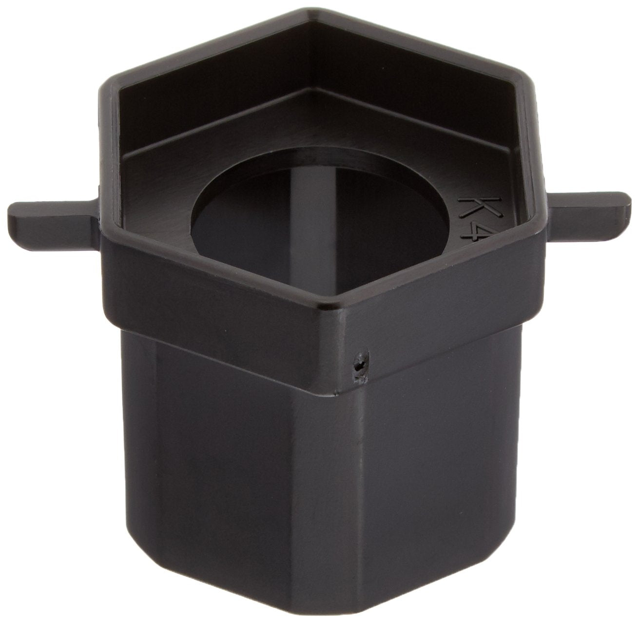 Black plastic Delta wrench tool with hexagonal socket opening and side handles.