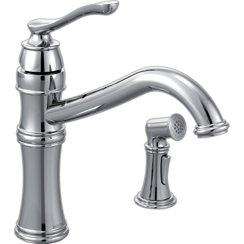 Chrome kitchen faucet with high arc spout, single lever handle, and separate side spray attachment.