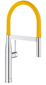 Chrome kitchen faucet with yellow flexible hose spout and single control lever.