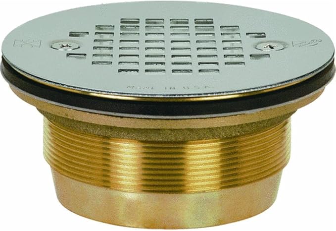 Brass modular shower drain with slotted stainless steel cover and threaded collar connection.