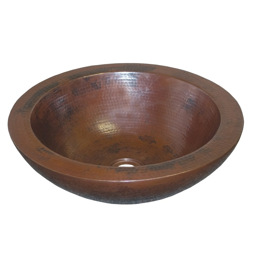 Hammered copper vessel sink with antique brown finish and textured bowl surface.