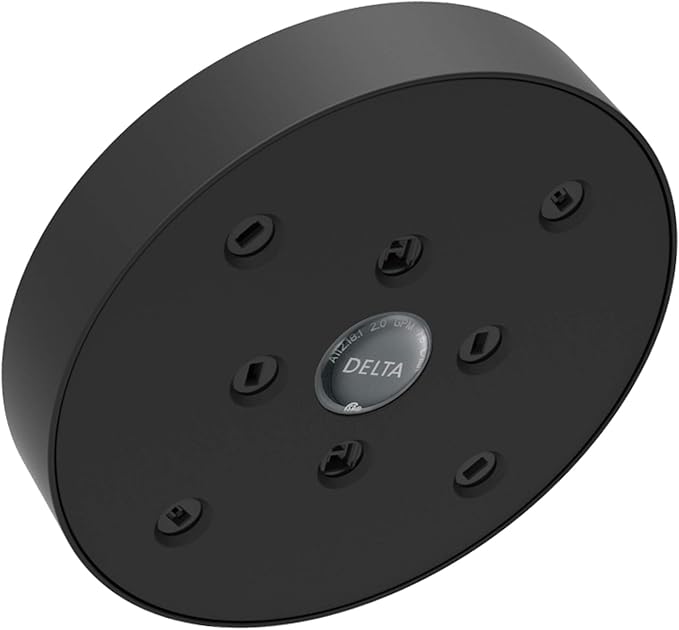 Matte black round raincan shower head with multiple spray jets and Delta logo center medallion.