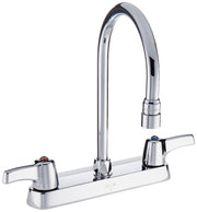 Chrome two-handle deck mount faucet with high arc spout and lever handles on white base.