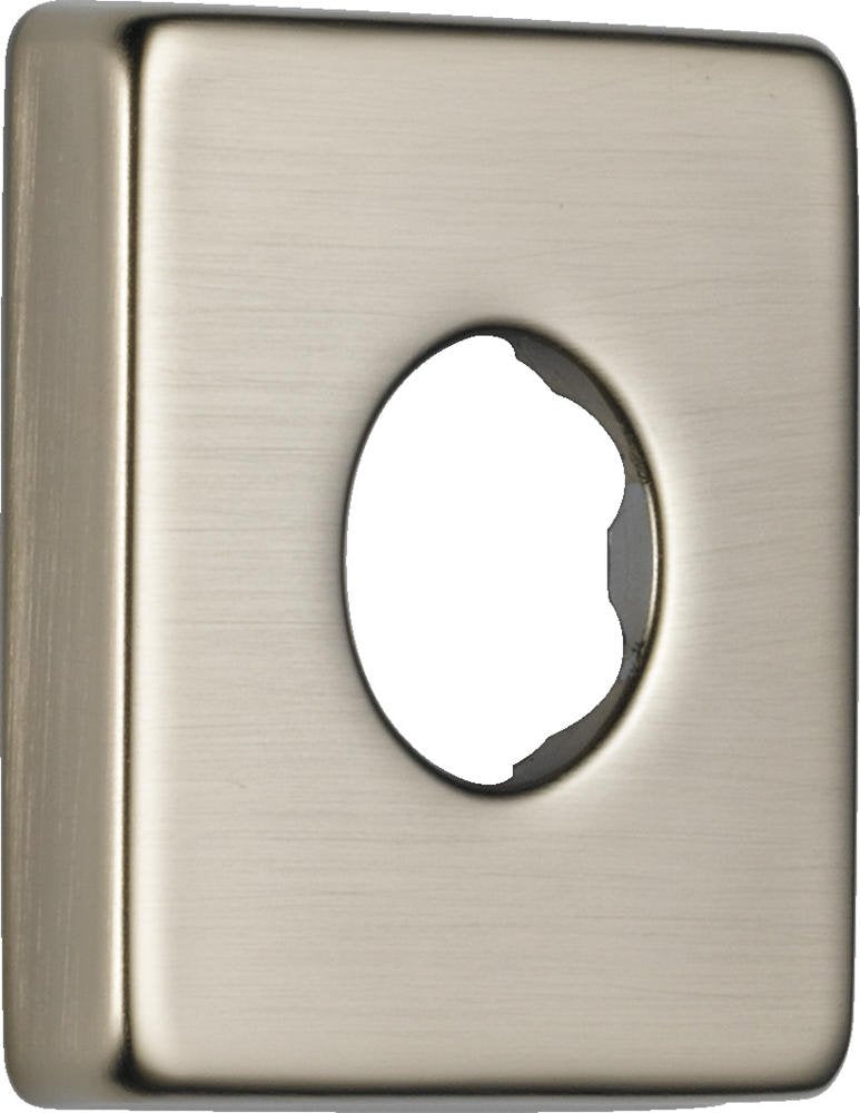 Stainless steel shower flange with brushed finish and oval opening for pipe connection.
