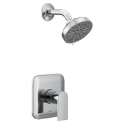 Chrome shower trim kit with single handle valve and round showerhead with perforations.