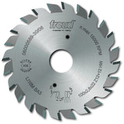 Freud 100mm split scoring saw blade with multiple teeth and center arbor hole, marked with specifications and made in Italy.