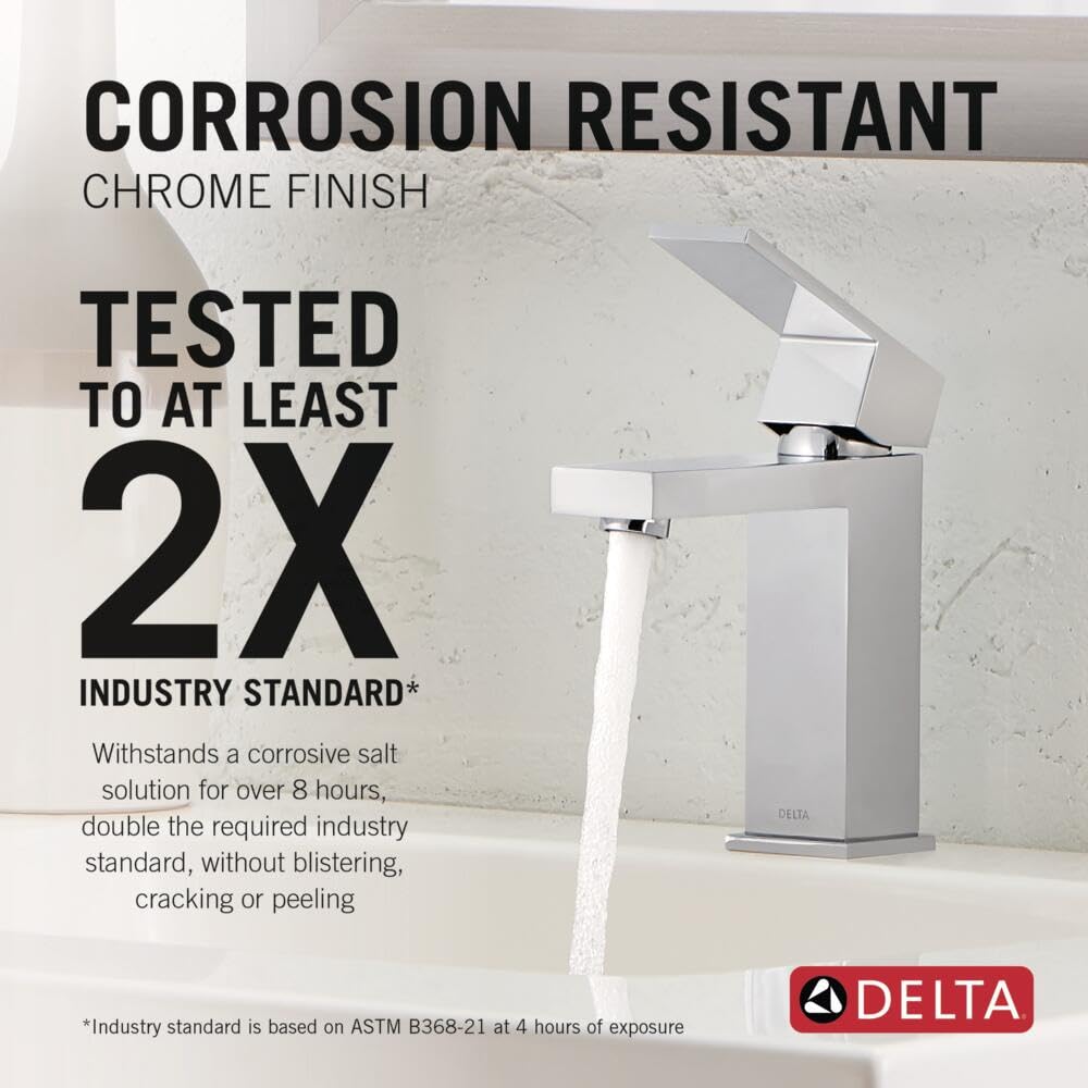 Chrome single-handle bathroom faucet with rectangular spout and low-flow design, water running from tap.