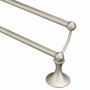 Brushed nickel double towel bar with two parallel horizontal rods and sphere finials on pedestal base.