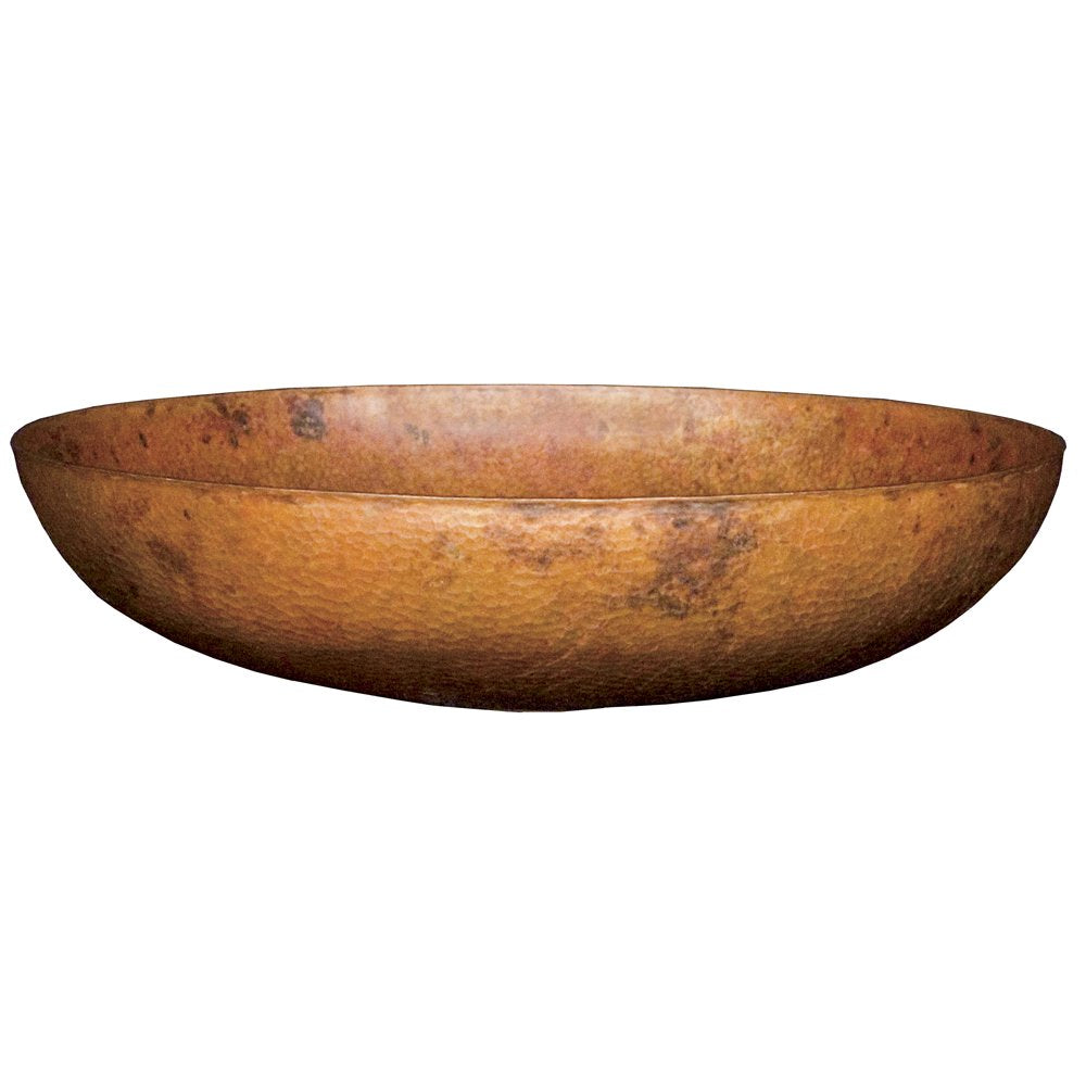 Oval hammered copper vessel sink with textured surface in warm bronze tones.