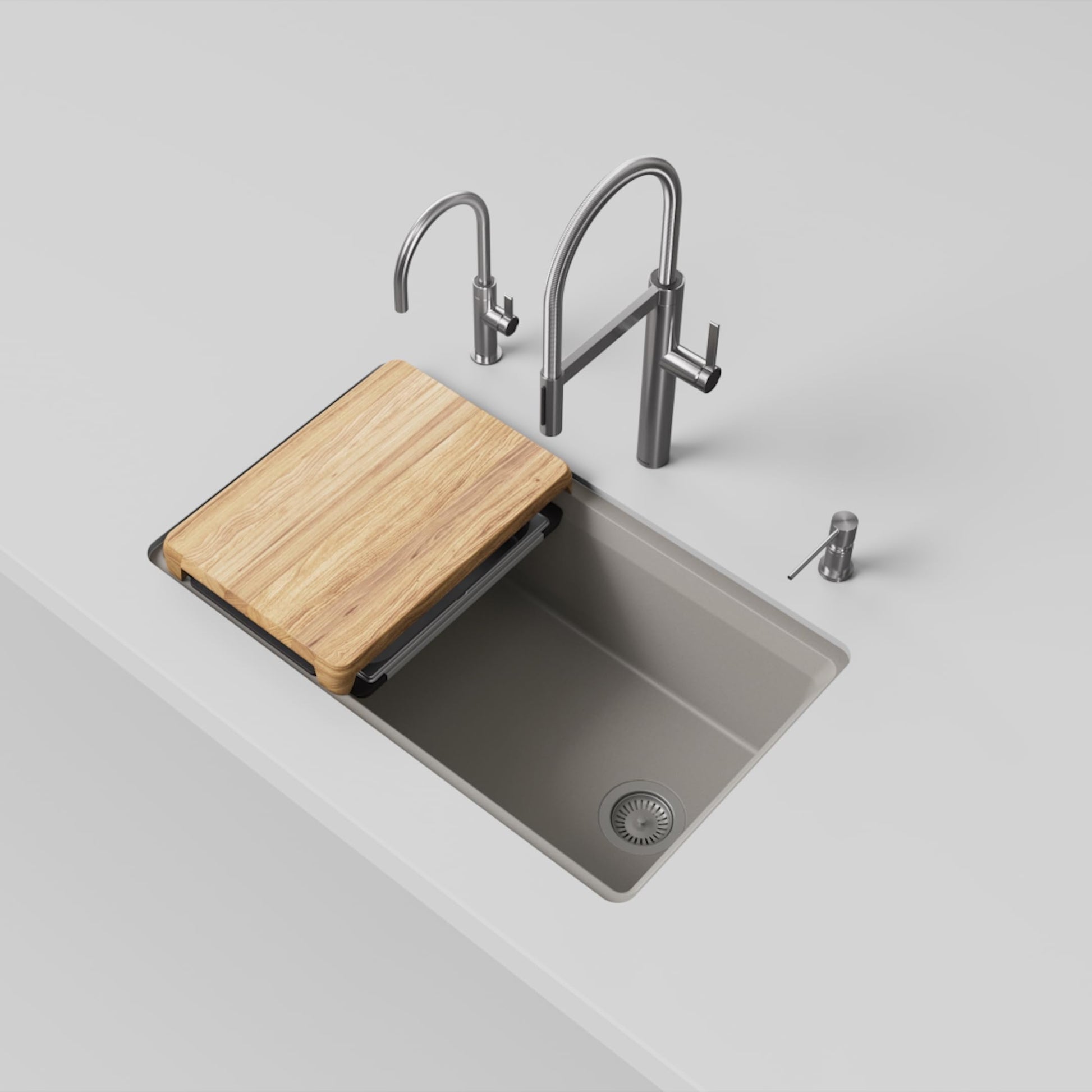 Truffle-colored single bowl kitchen sink with wooden cutting board, two faucets, and soap dispenser.