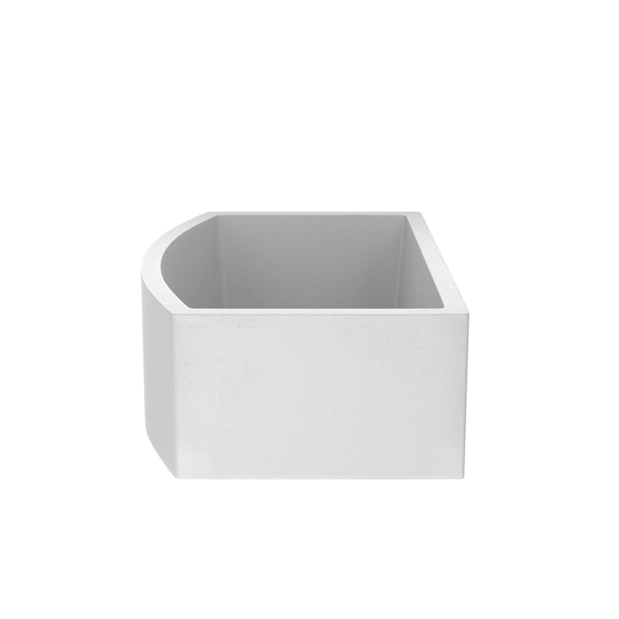 Pearl white farmhouse kitchen sink with single basin and rounded front corner detail.