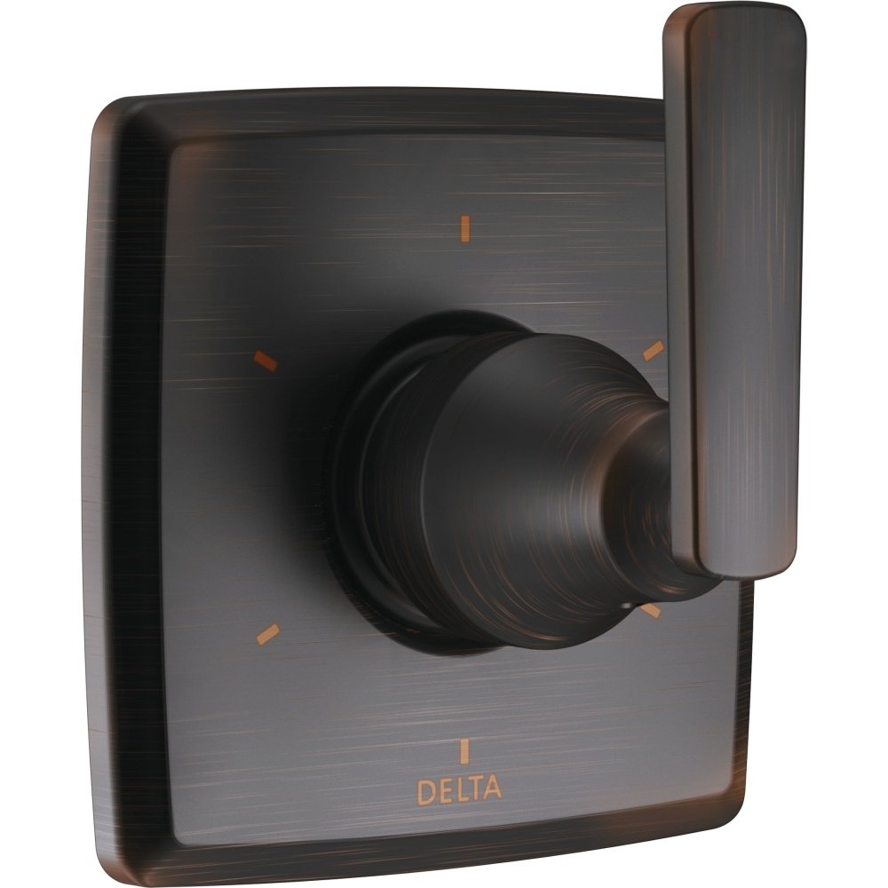 Bronze diverter trim with rounded square escutcheon plate, central rotating dial, and vertical lever handle.