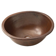 Oval hammered copper bathroom sink with antique patina finish and single drain hole.