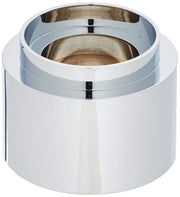 Cylindrical chrome and white metal sleeve with nested rings and internal brass-colored component.