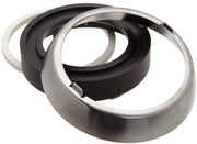 Stainless steel trim ring, black rubber gasket, and metal base components stacked together.