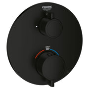 Matte black round thermostatic valve trim with two circular handles, temperature dial displaying 38°C, and Grohe branding.