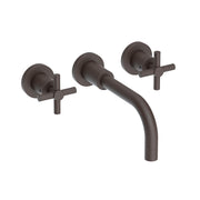 Oil rubbed bronze wall-mounted bathroom faucet with curved spout and two lever handles on round rosettes.