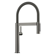 Satin dark steel kitchen faucet with tall square body, arched sprayer hose, and side lever control.