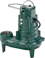 Green cast iron sewage pump with attached discharge hose and control handle.