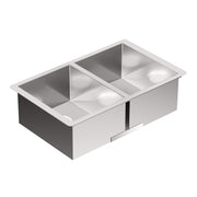 Stainless steel double bowl undermount kitchen sink with two equal-sized compartments and polished finish.