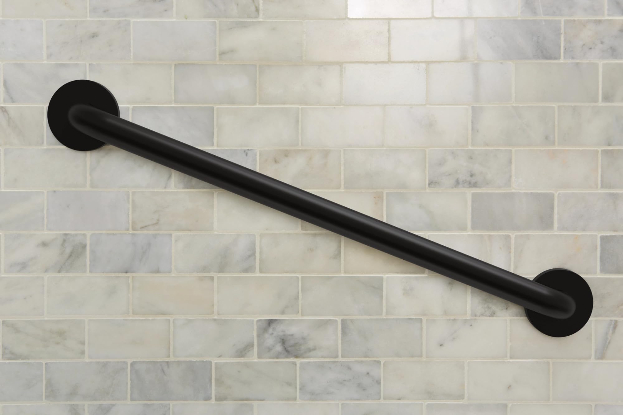 Black cylindrical grab bar with round mounting flanges mounted horizontally on subway tile wall.