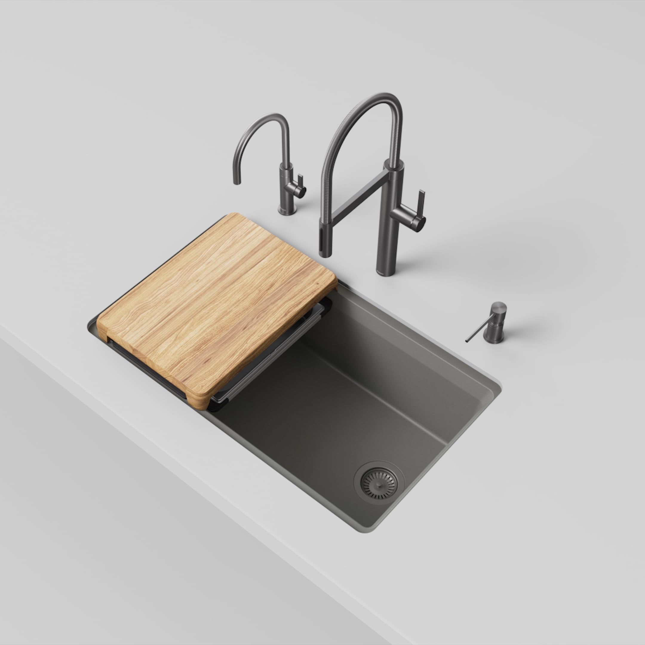 Gray composite kitchen sink with wood cutting board, two arc faucets, and soap dispenser.
