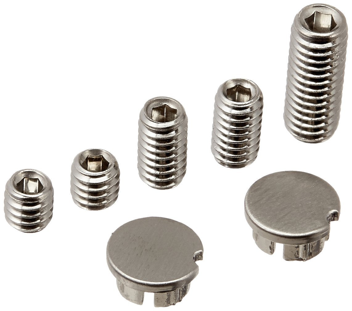 Four stainless steel set screws with hex sockets and two stainless steel button caps in brushed finish.