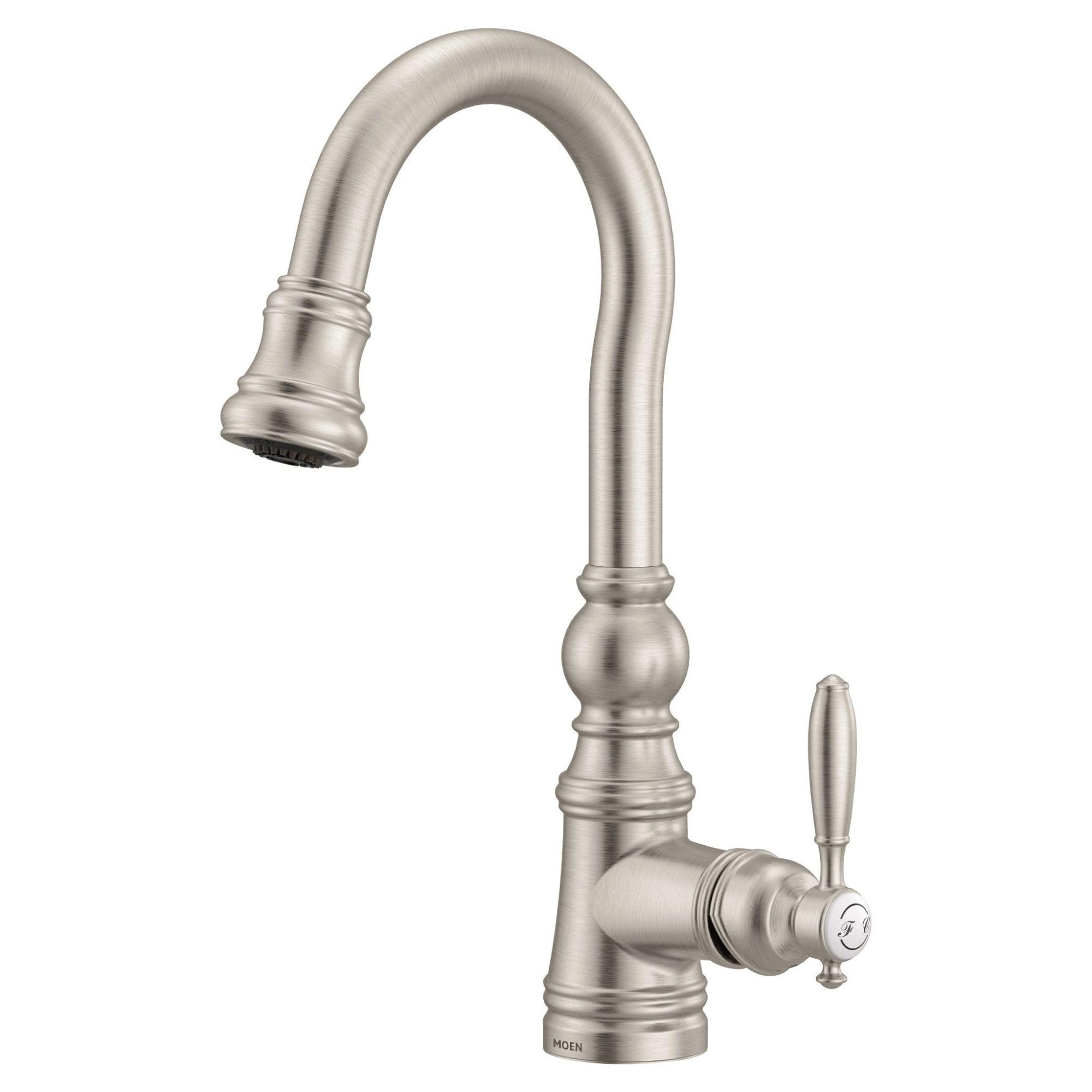 Stainless steel pulldown kitchen faucet with curved spout, single lever handle, and brushed finish.