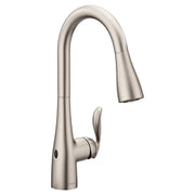 Stainless steel kitchen faucet with curved spout, pull-down spray head, and single lever handle.