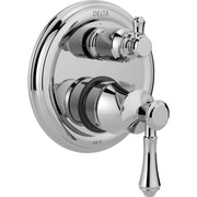 Chrome Delta shower valve trim with two handles and integrated diverter control on circular escutcheon plate.