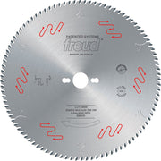 Freud LU1I0600 300mm carbide-tipped circular saw blade with 96 teeth, center bore hole, and red tooth design markings.
