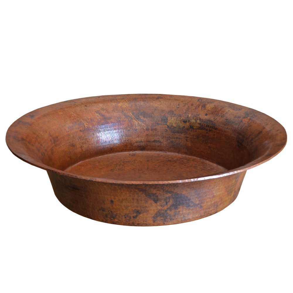 Hammered copper vessel sink with wide, shallow basin and textured surface patina.