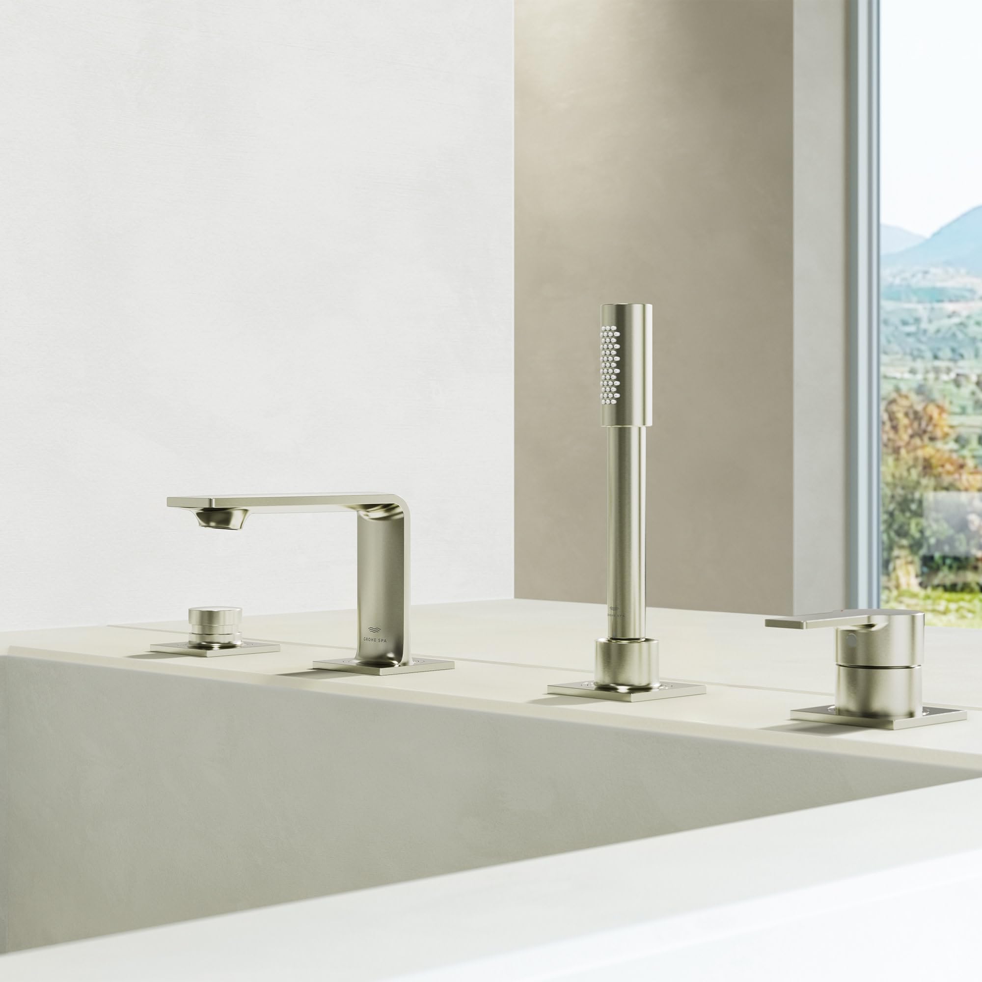 Brushed nickel four-hole roman tub faucet with single handle spout and tall hand shower wand mounted on deck.
