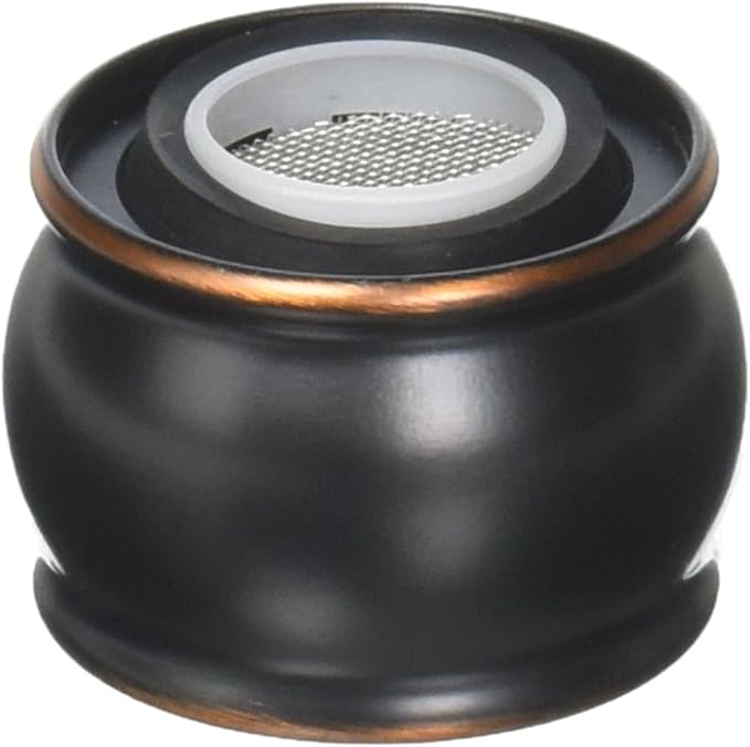 Black spherical faucet aerator with white mesh screen insert and bronze accent ring.