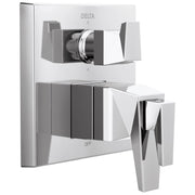 Chrome and gray two-handle shower valve trim with upper diverter control and lower temperature lever on white escutcheon plat