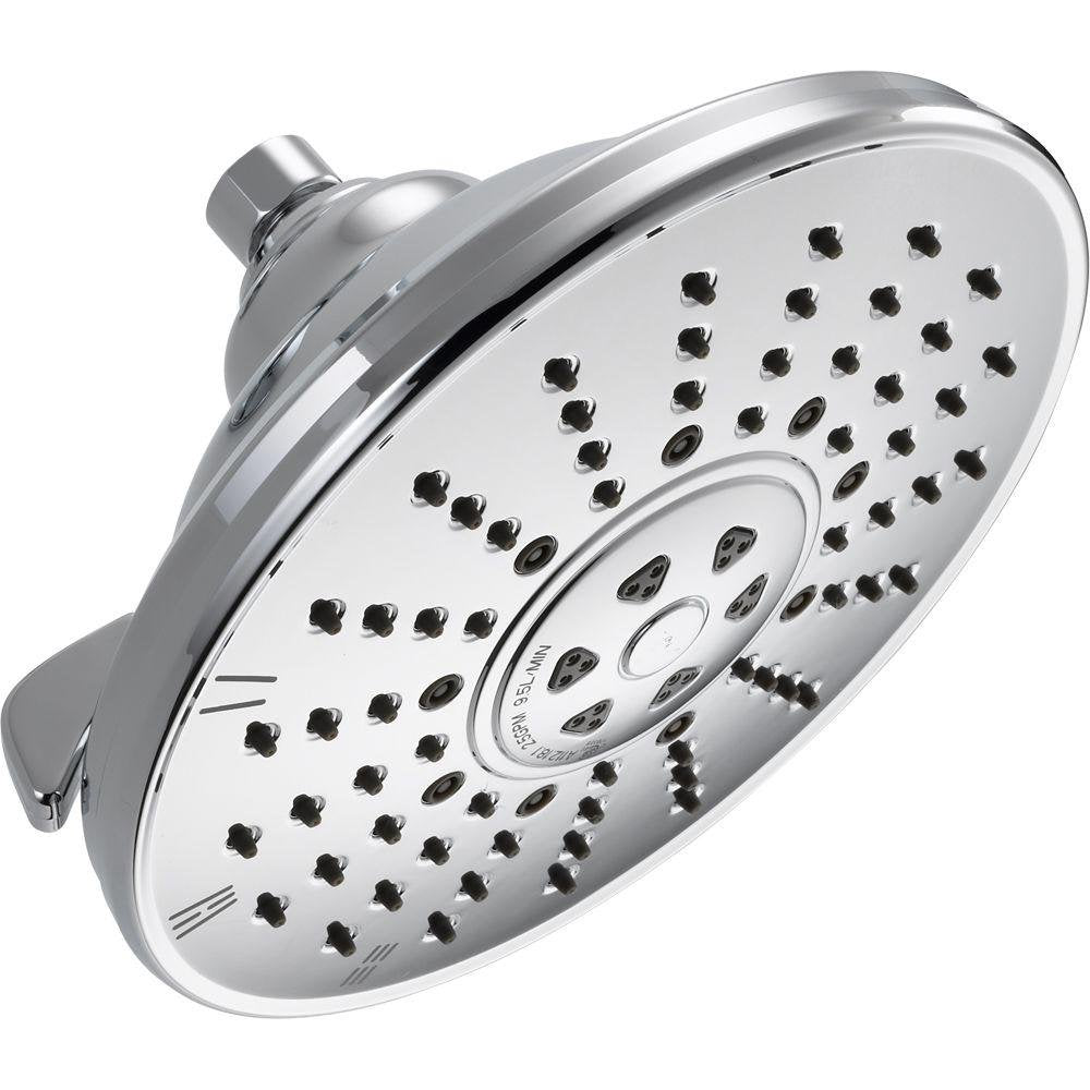 Chrome raincan shower head with multiple spray jets and adjustable center dial for water setting control.
