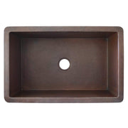 Antique copper rectangular undermount kitchen sink with hammered finish exterior and single drain hole.