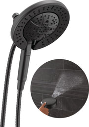 Matte black dual showerhead with multiple spray jets and flexible hose, detail shows handheld spray function.