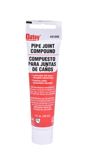 Gray pipe joint compound sealant tube with red and white label, 1 fl. oz. size.