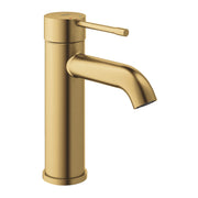Grohe Essence brushed gold single-hole bathroom faucet with single lever handle and curved spout.