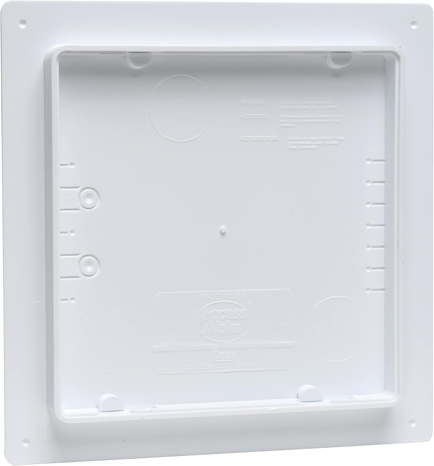 White plastic access panel with recessed interior, mounting holes, and circular knockouts for pipes or conduits.