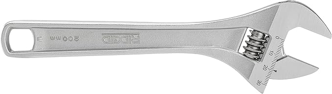 Silver metal adjustable wrench with open jaw and measurement markings on the handle.