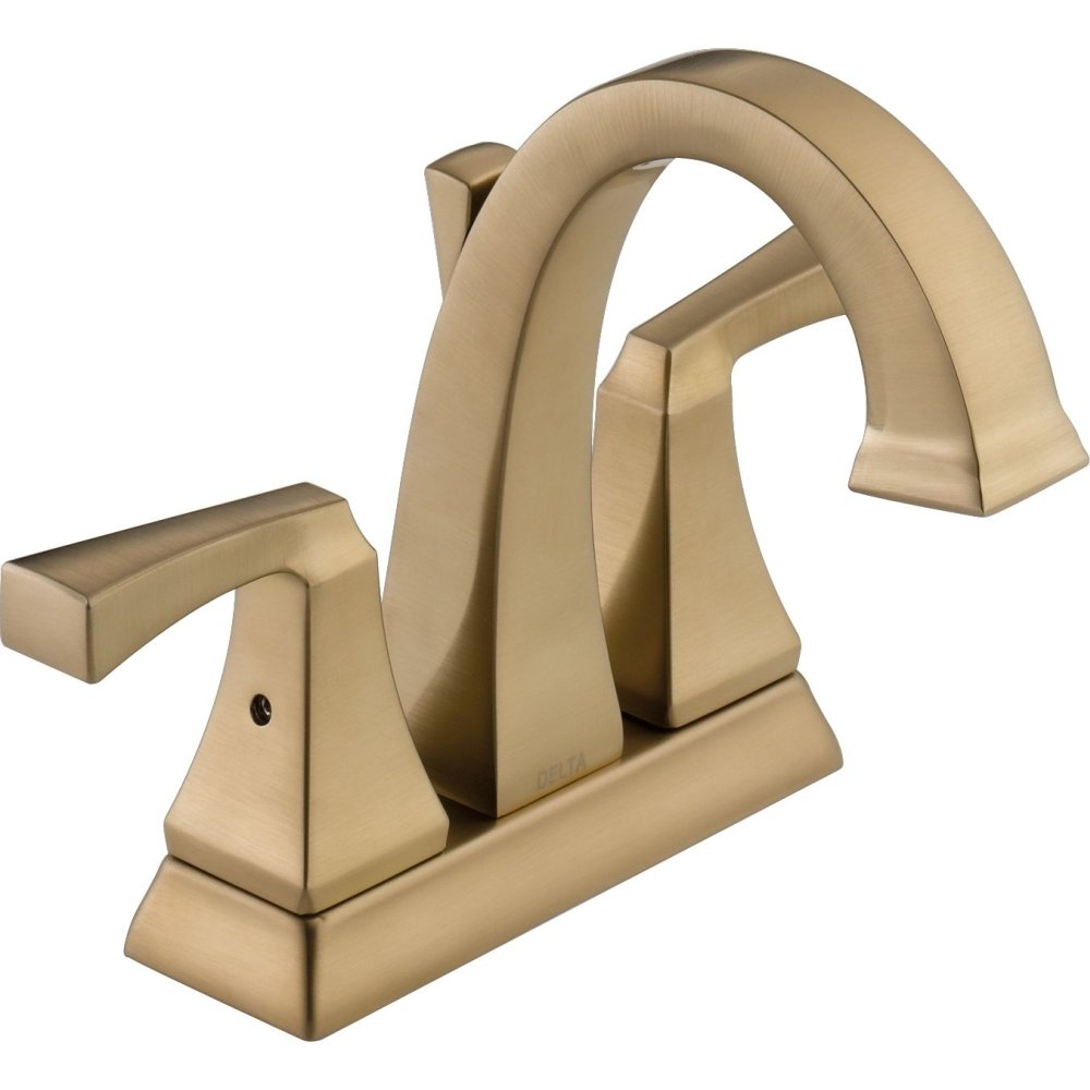 Champagne gold two-handle bathroom faucet with curved spout and rectangular lever handles on wide base.